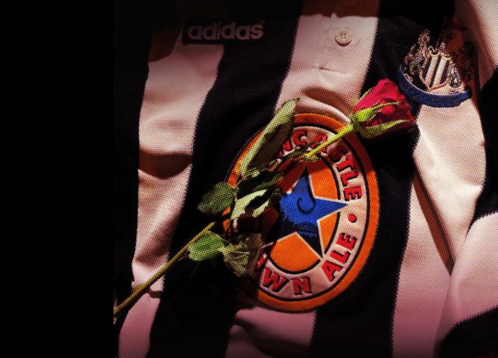 Love It If We Beat Them lead image - NUFC top with rose laying on top
