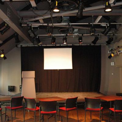Stage with screen and lecturn