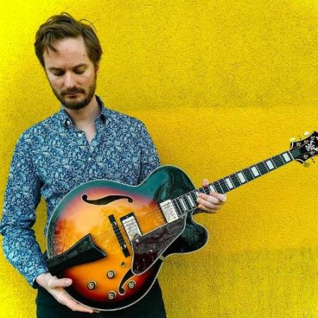 Ant Law with guitar
