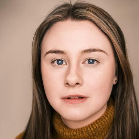 Portrait photograph of Rebecca Glendenning-Laycock looking to camera