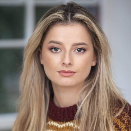 Portrait headshot of Caitlyn - looking to camera