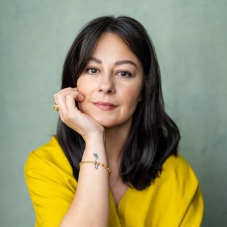 Portrait photograph of Nadia Iftkhar, looking to camera