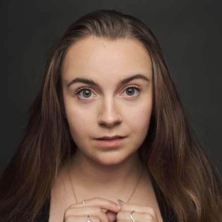 Portrait photograph of Mia Taylor looking to camera