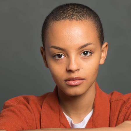 Portrait photograph of Bridget Marumo looking to camera