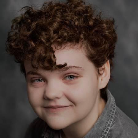 Portrait photograph of Beth Fletcher Morris looking to camera