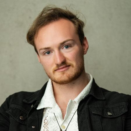 Will Sutherland looking to camera