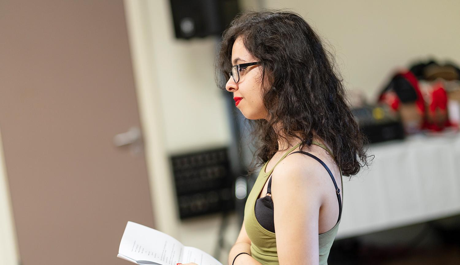 Young Woman wth script in her hand