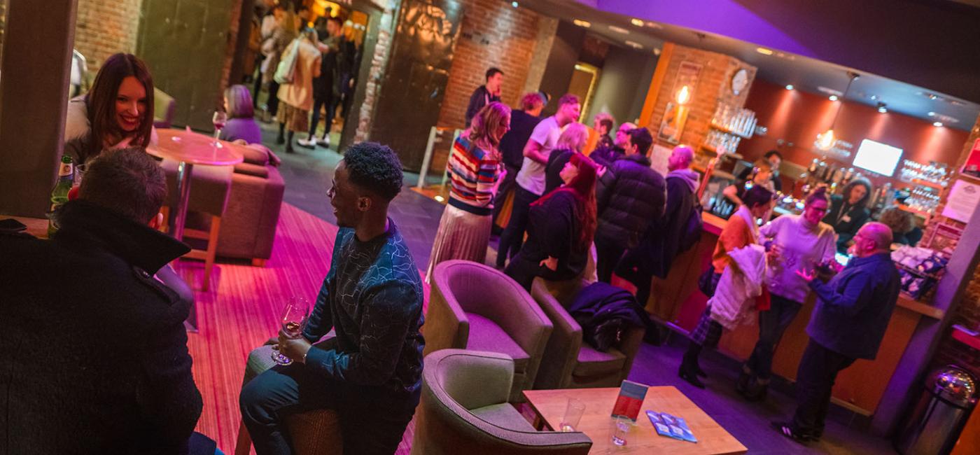 People in Live Theatre's bar