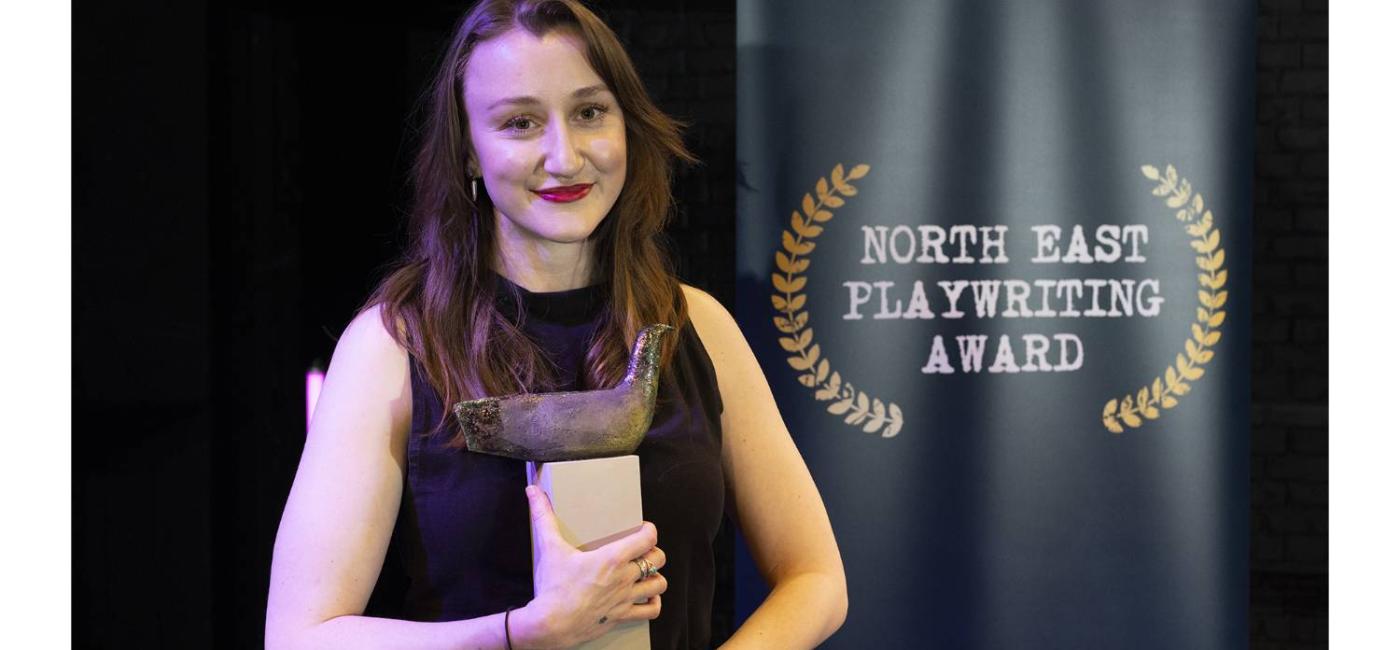 Emile Robson receiving North East Playwriting Award