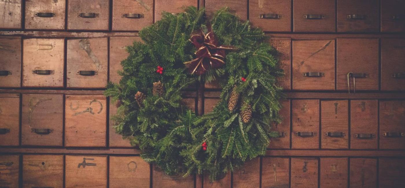 Christmas wreath against boxes