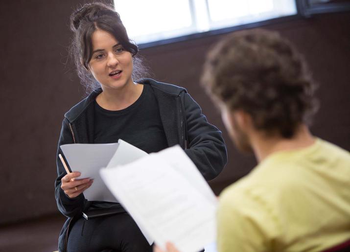 Introduction to playwriting image of two actors reading scripts