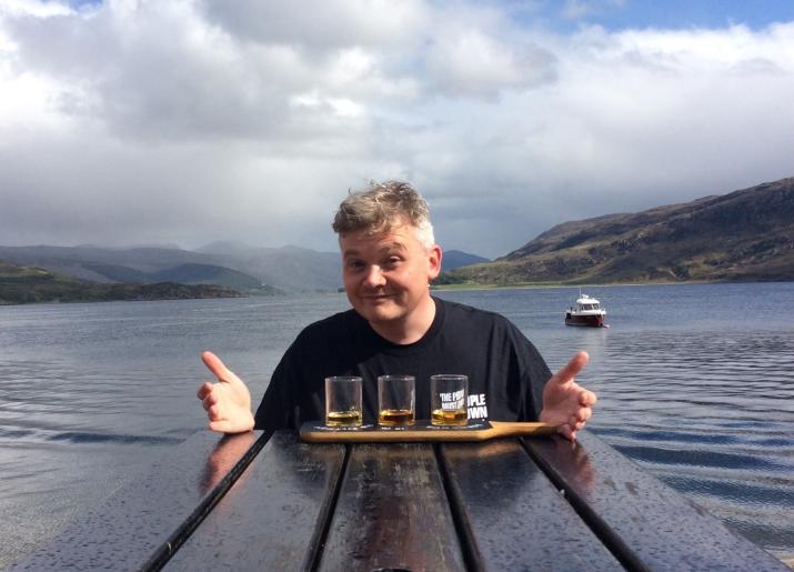 Joe Douglas by Loch with Whisky taster glasses