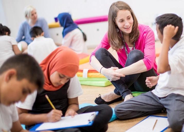 Christina Castling project lead for Live Tales with pupils enjoying a story writing workshop