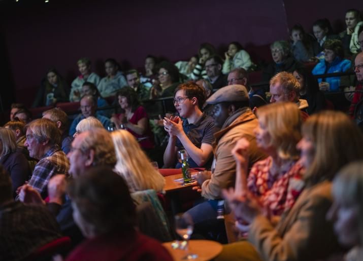 Photo of audience in a theatre