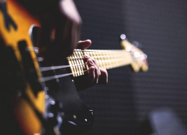 A person playing a guitar