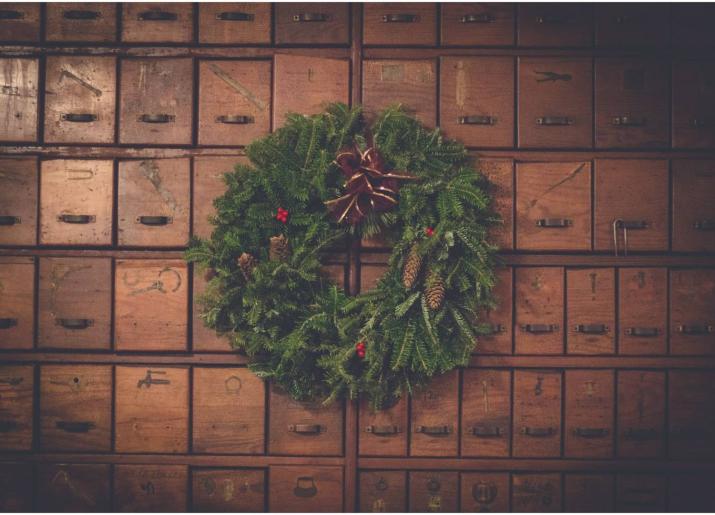 Christmas wreath against boxes