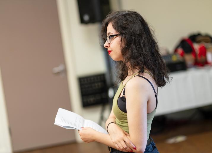 Young Woman wth script in her hand