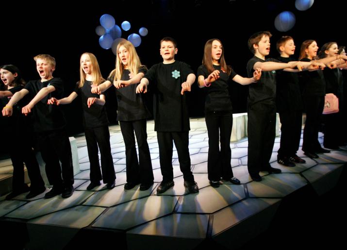 Artsmark, group of children on stage