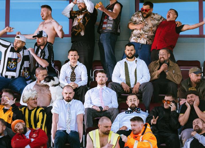 Metroland Comedy members in a football stand